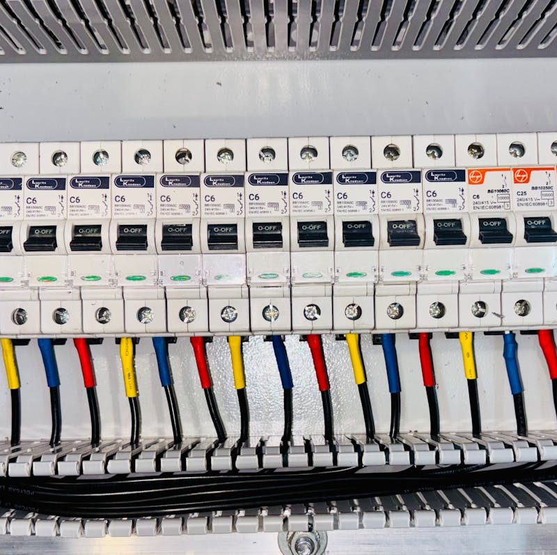 electrical-circuit-breaker-panel-with-color-coded-wiring