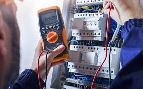 Emergency electrician in Albany inspecting a residential switchboard